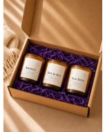 Gift box containing three amber soy candles with Horchata Cafe de Olla and Palo Santo scents