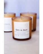 Amber glass Cafe de Olla hand-poured soy candle with minimalist label and natural wooden wick.