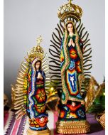 Beaded Huichol Guadalupe figurines with colorful patterns and golden crown details